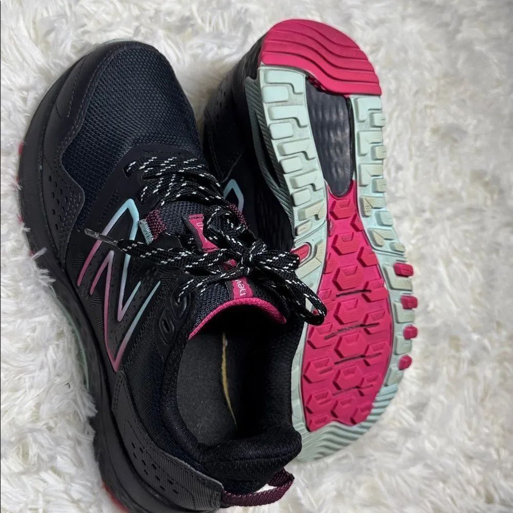 New Balance Black Sneakers with Pink Highlights